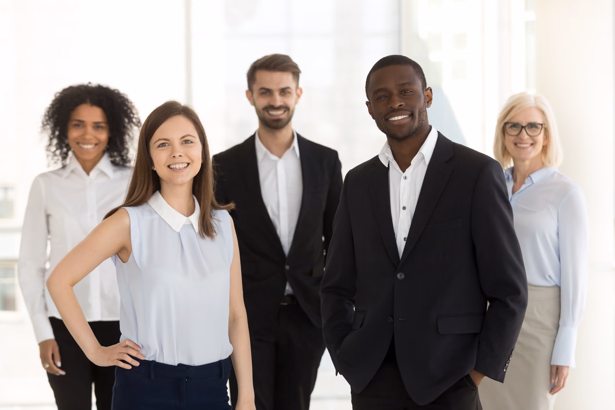 A diverse team of happy real estate agents